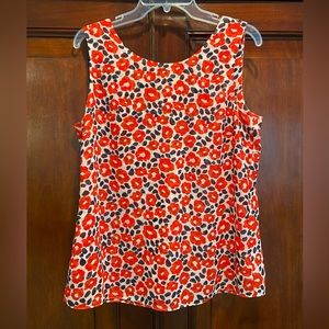 Cabi sleeveless top. Red/white/black polyester. Reversible. Size Medium.